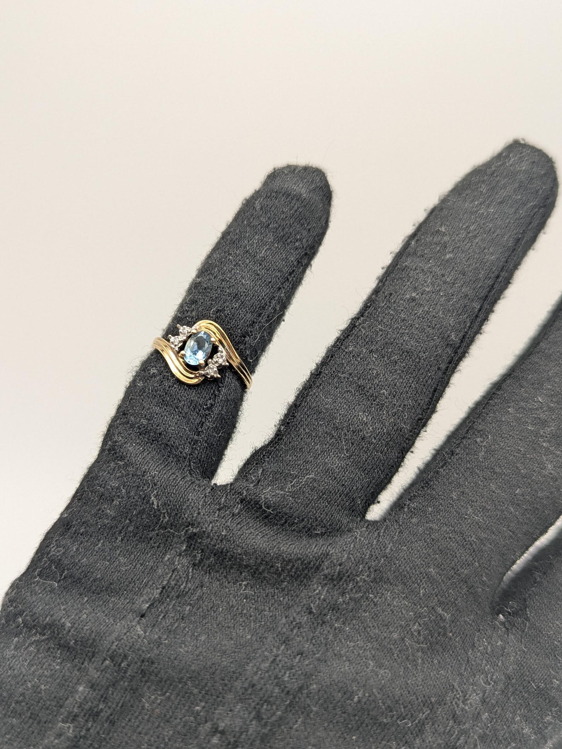 10k Yellow Gold Diamond and Blue Topaz Cocktail Ring