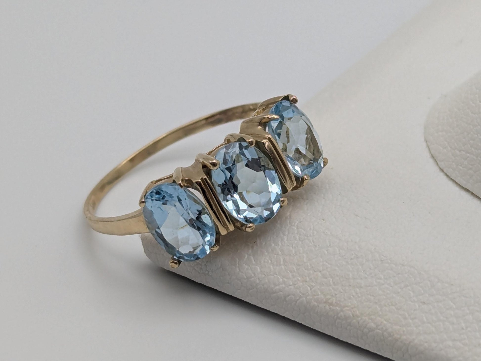 10k Yellow Gold Triple Stone Blue Topaz Cocktail Ring