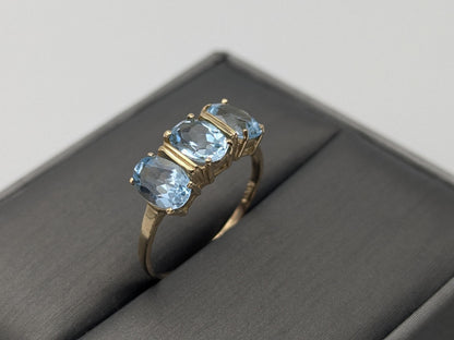 10k Yellow Gold Triple Stone Blue Topaz Cocktail Ring