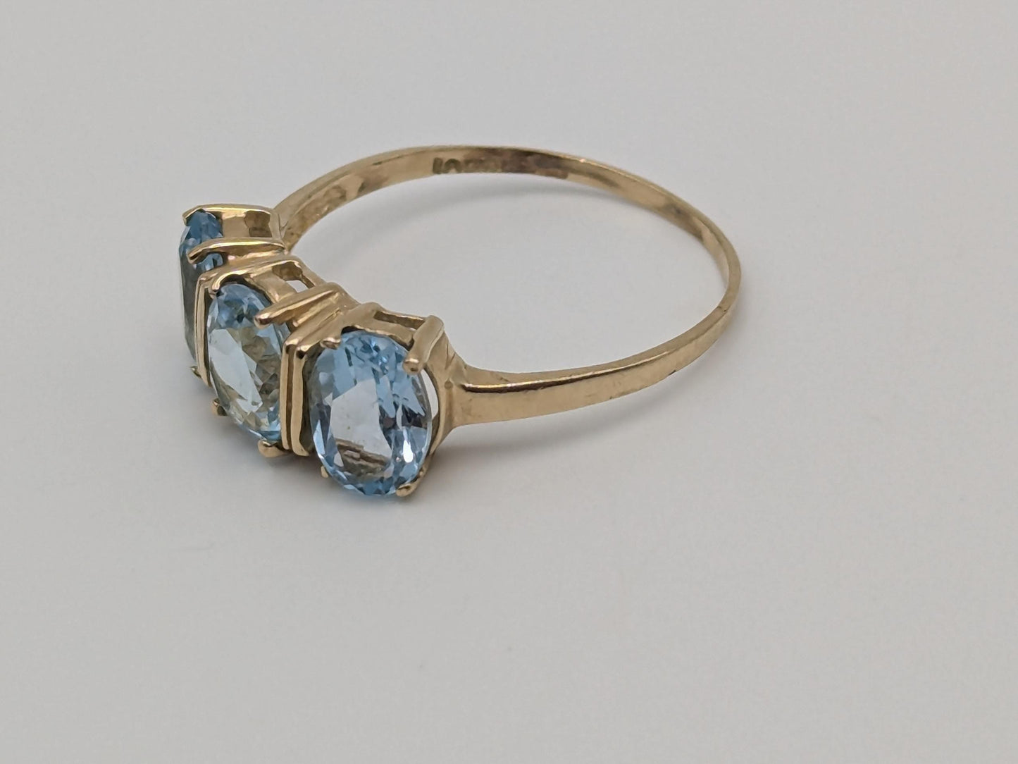 10k Yellow Gold Triple Stone Blue Topaz Cocktail Ring