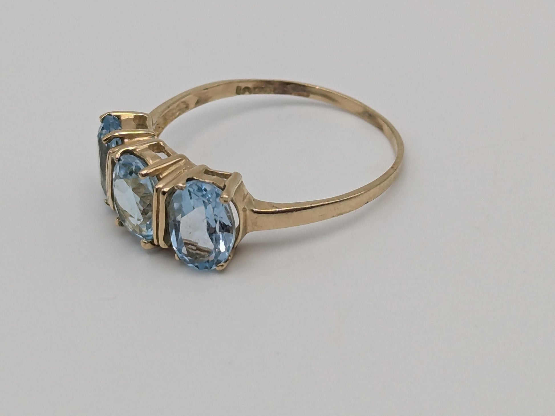 10k Yellow Gold Triple Stone Blue Topaz Cocktail Ring