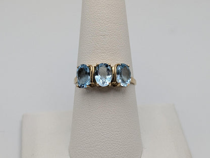 10k Yellow Gold Triple Stone Blue Topaz Cocktail Ring