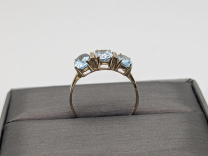 10k Yellow Gold Triple Stone Blue Topaz Cocktail Ring