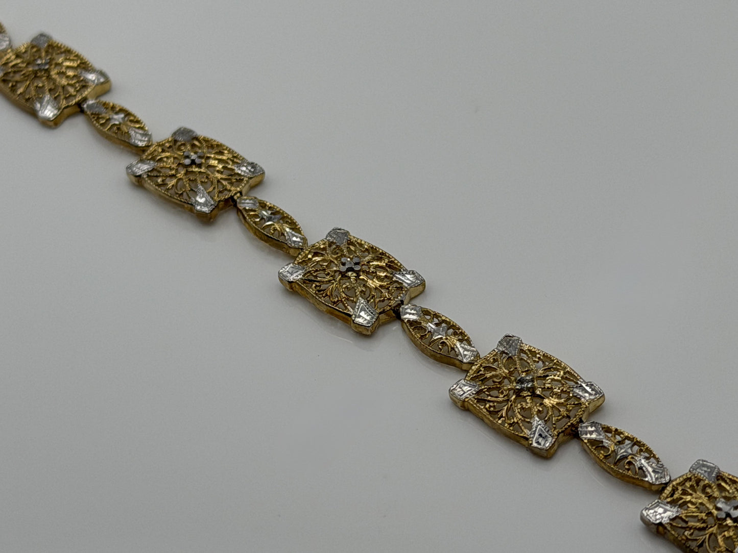 10k Two Tone Diamond Bracelet. Diamond Cut Design Tennis Bracelet 7"