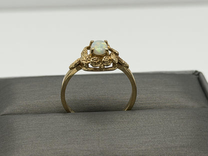 10k Yellow Gold Natural Oval Opal Solitaire Delicate Leaf Textured Ring.