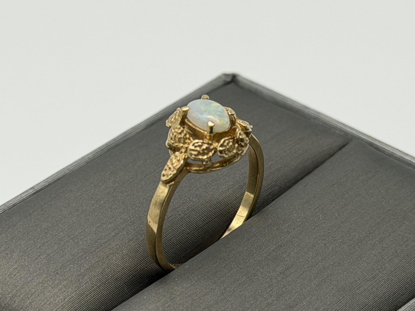 10k Yellow Gold Natural Oval Opal Solitaire Delicate Leaf Textured Ring.