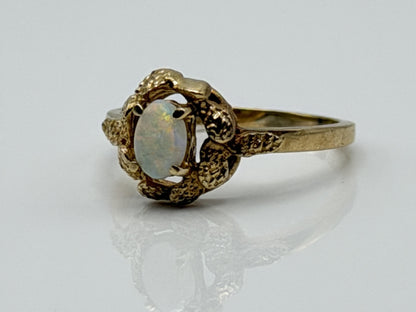 10k Yellow Gold Natural Oval Opal Solitaire Delicate Leaf Textured Ring.