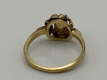 10k Yellow Gold Natural Oval Opal Solitaire Delicate Leaf Textured Ring.