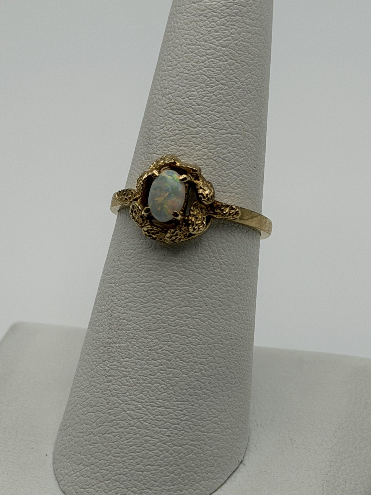 10k Yellow Gold Natural Oval Opal Solitaire Delicate Leaf Textured Ring.