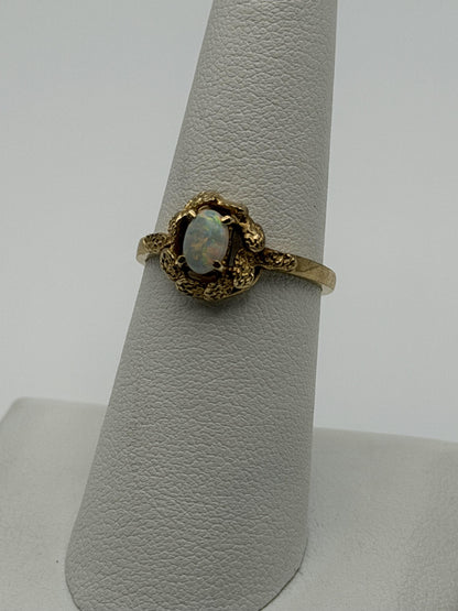 10k Yellow Gold Natural Oval Opal Solitaire Delicate Leaf Textured Ring.