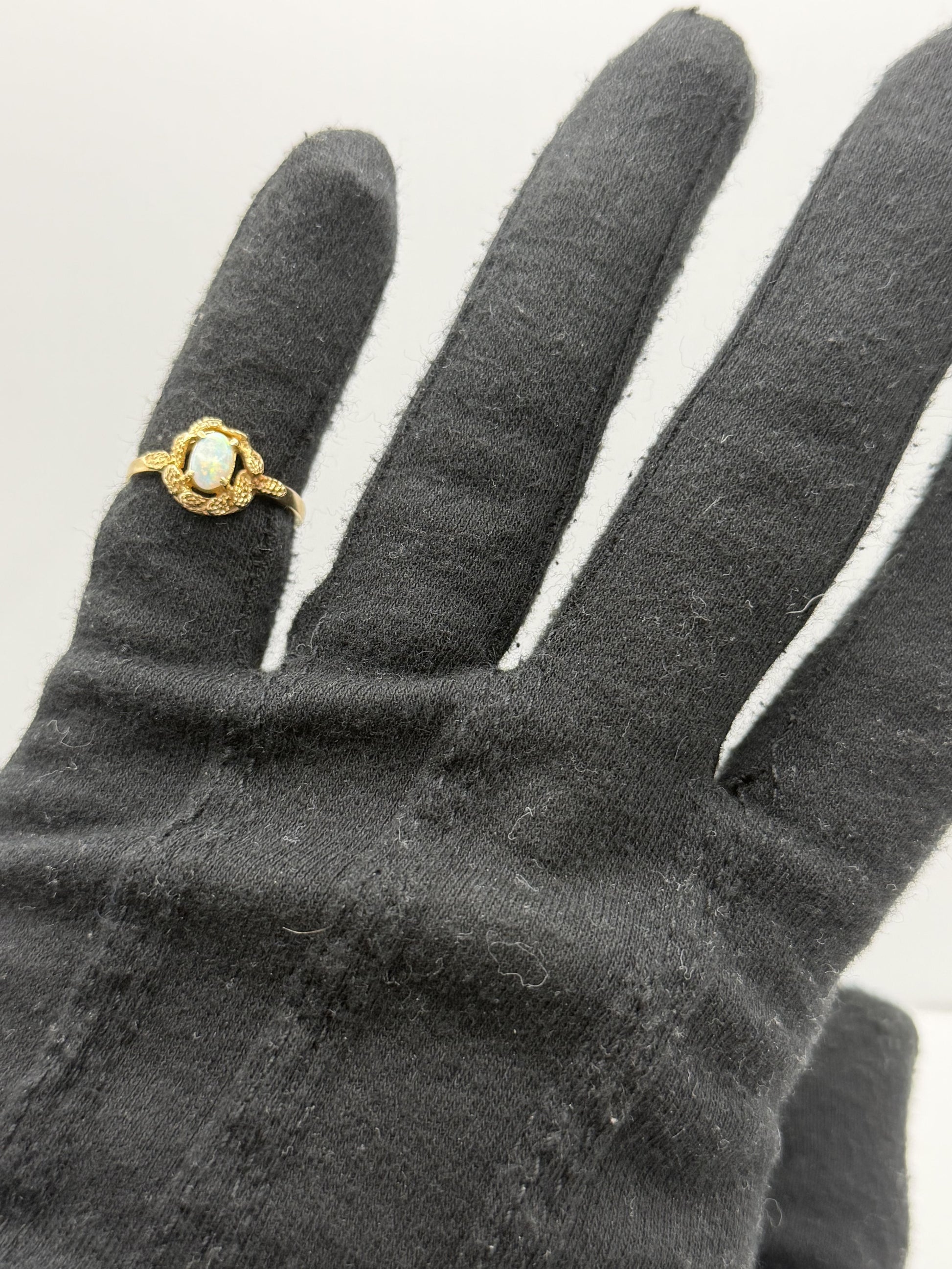 10k Yellow Gold Natural Oval Opal Solitaire Delicate Leaf Textured Ring.