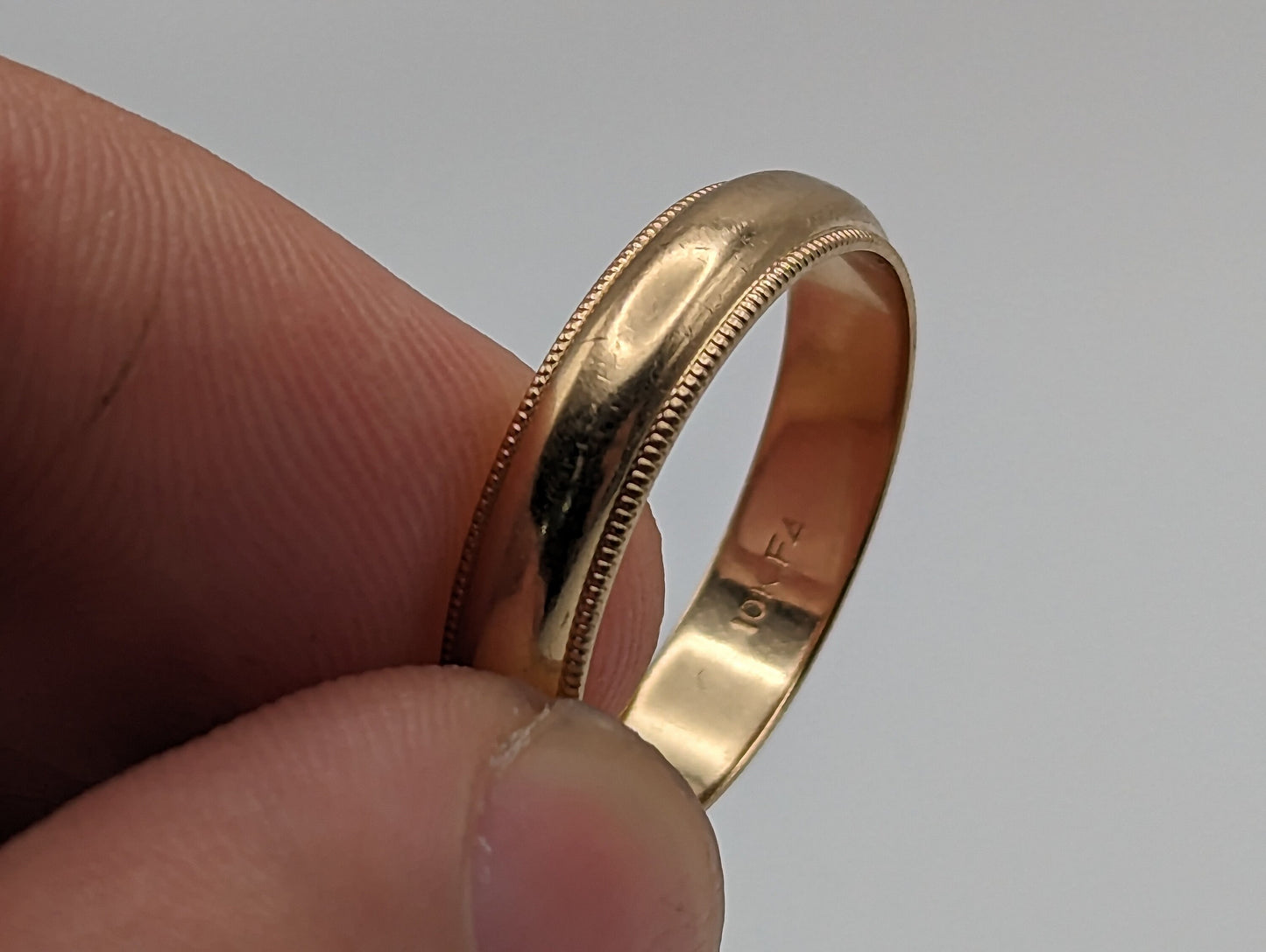 4.2 grams Friedman's 10k Gold 5mm Milgrain Half Round Wedding Band. 10k Yellow Gold Milgrain Band. Yellow Gold Wedding Engagement Band