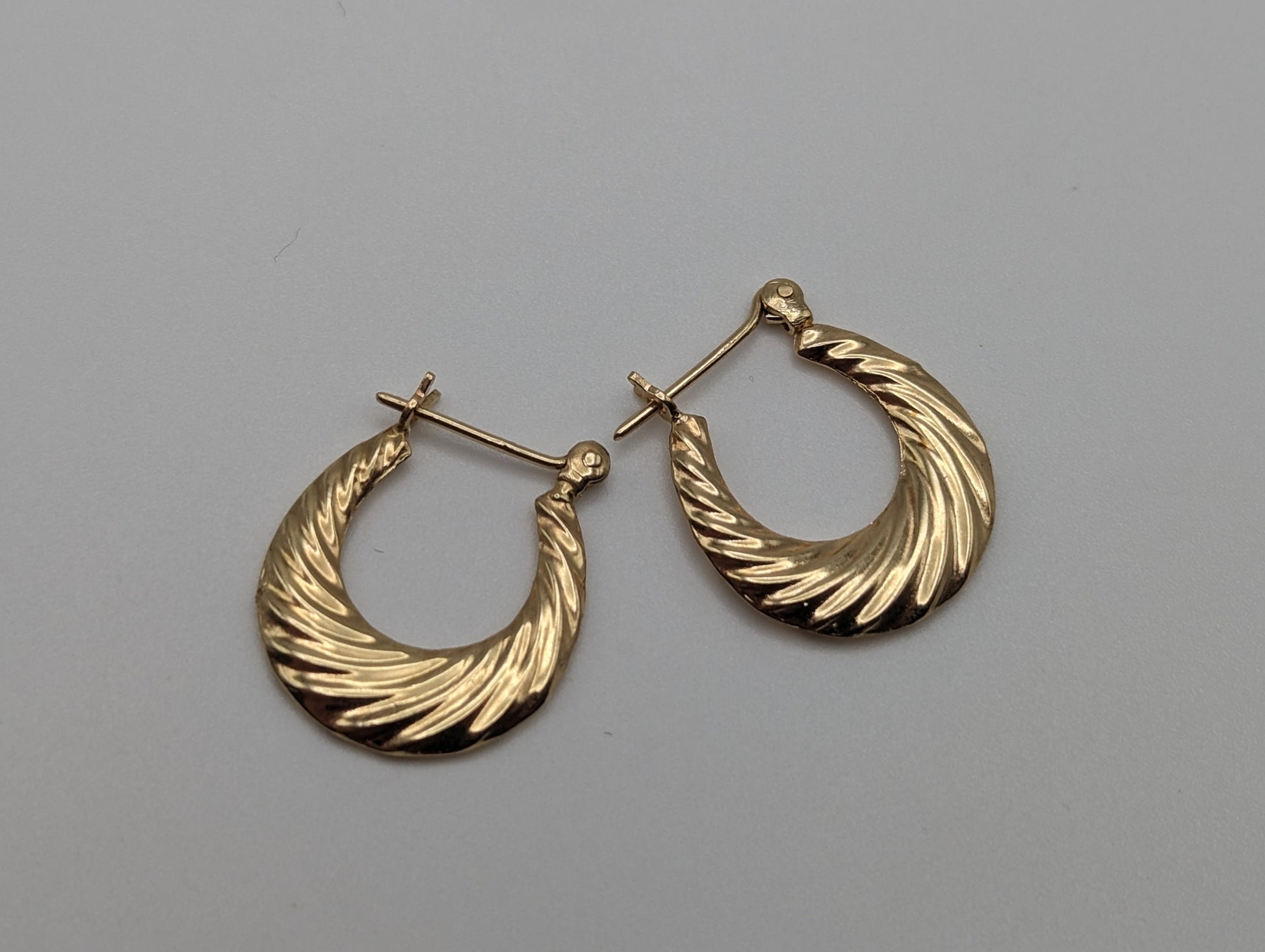 14k Yellow Gold Hollow Puff Earrings. 14k Gold Hollow Shrimp Hoop Earrings. 14k Hollow Hoop Earrings. 14k Gold Hoops.