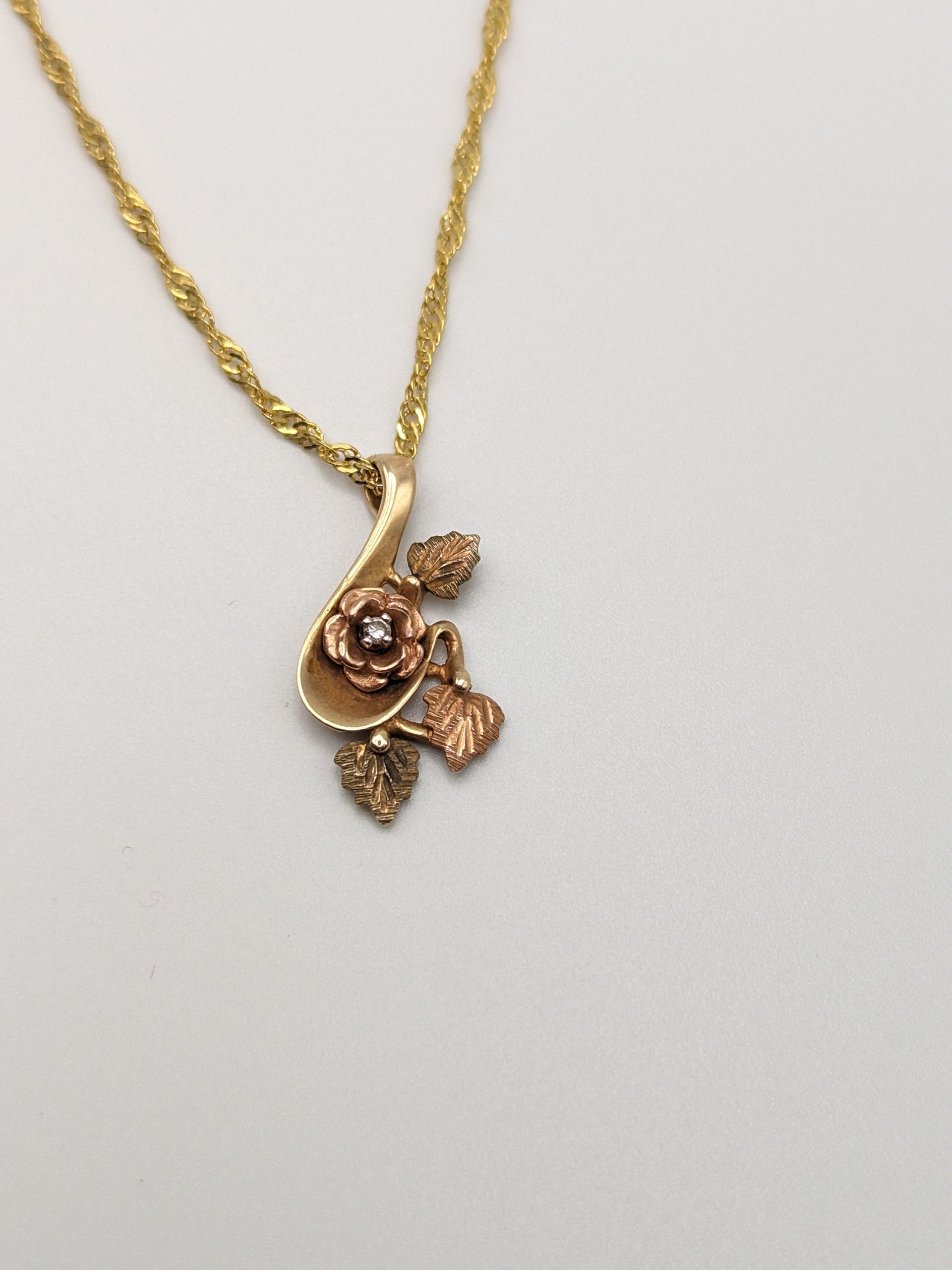 10K gold outlets black hills styled rose pendant