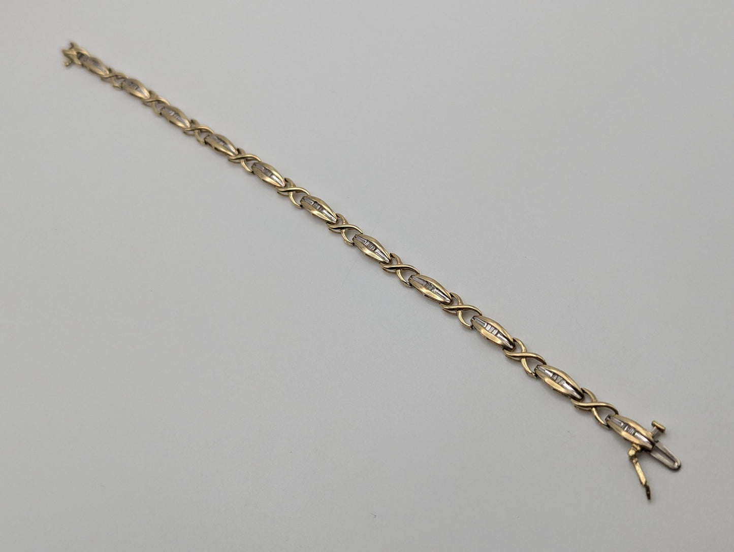 10k Solid Yellow Gold Baguette Diamond .66ct XOXO Love Tennis Bracelet 7"