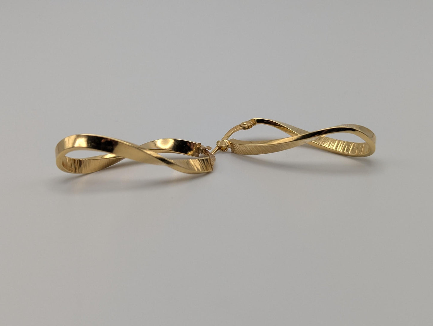 14k ITALY Twisted Long Infinity Hoop Etched Earrings. Etched Twisted Hoops