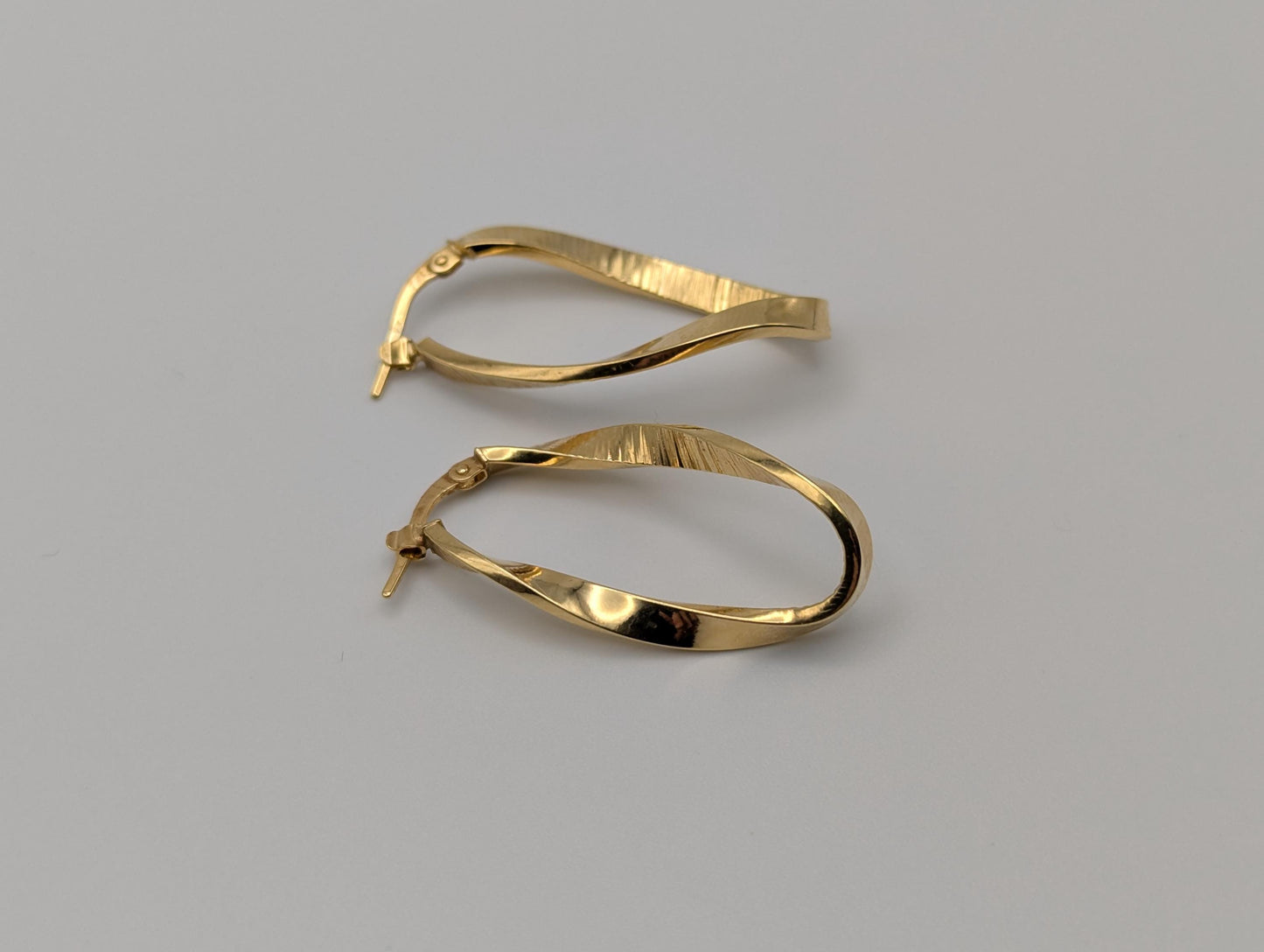 14k ITALY Twisted Long Infinity Hoop Etched Earrings. Etched Twisted Hoops