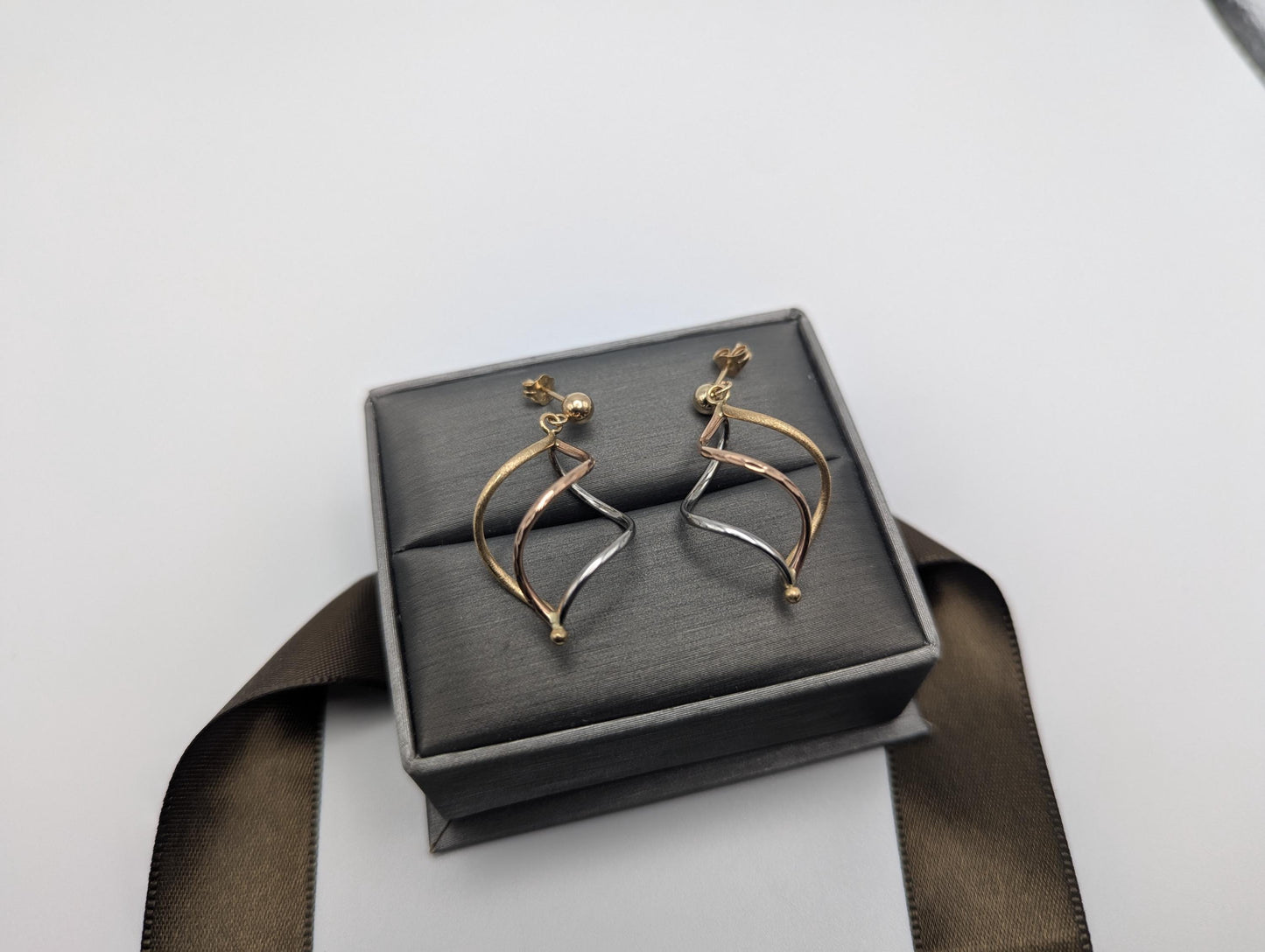 14k Multi-Gold Twisted Infinity Dangle Earrings. Twisted Classic Dangle Hoops.