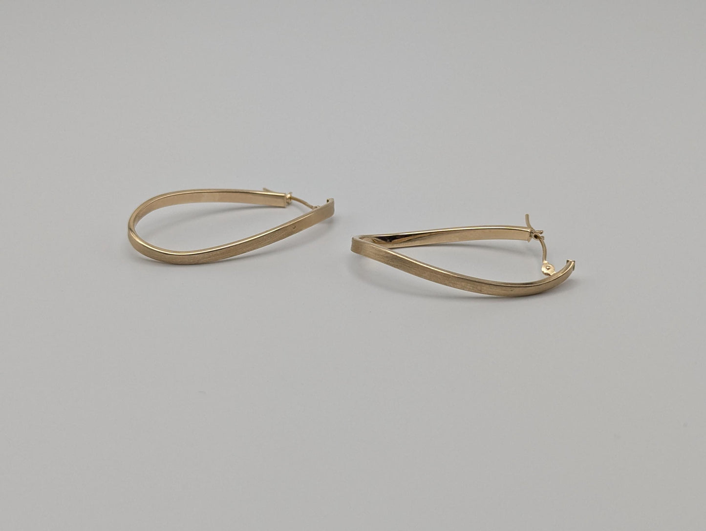 14k JCM Jacmel Twisted Long Hoop Earrings. Minimalist Twisted Hoops