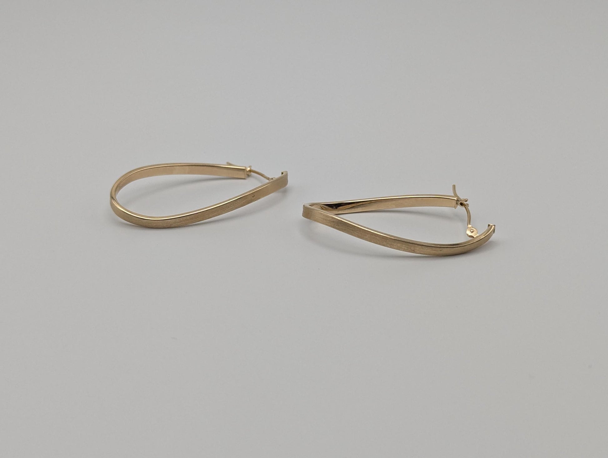 14k JCM Jacmel Twisted Long Hoop Earrings. Minimalist Twisted Hoops