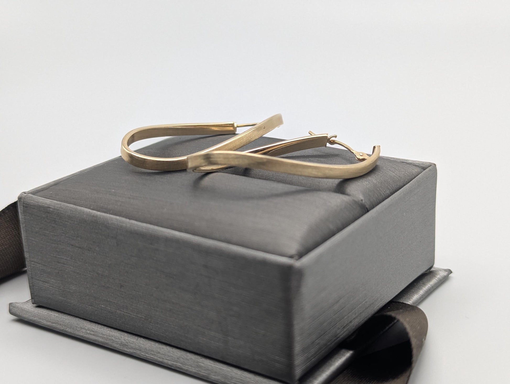 14k JCM Jacmel Twisted Long Hoop Earrings. Minimalist Twisted Hoops