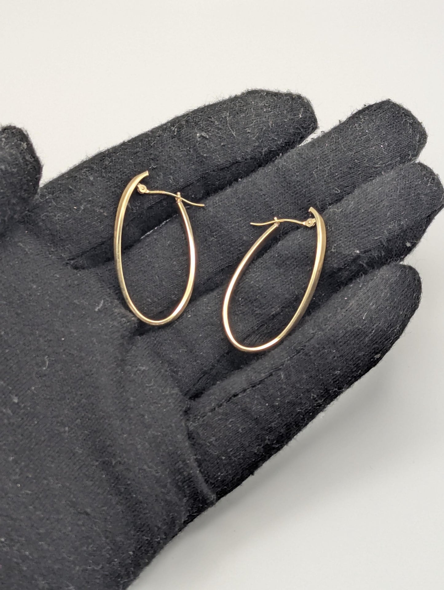 14k JCM Jacmel Twisted Long Hoop Earrings. Minimalist Twisted Hoops