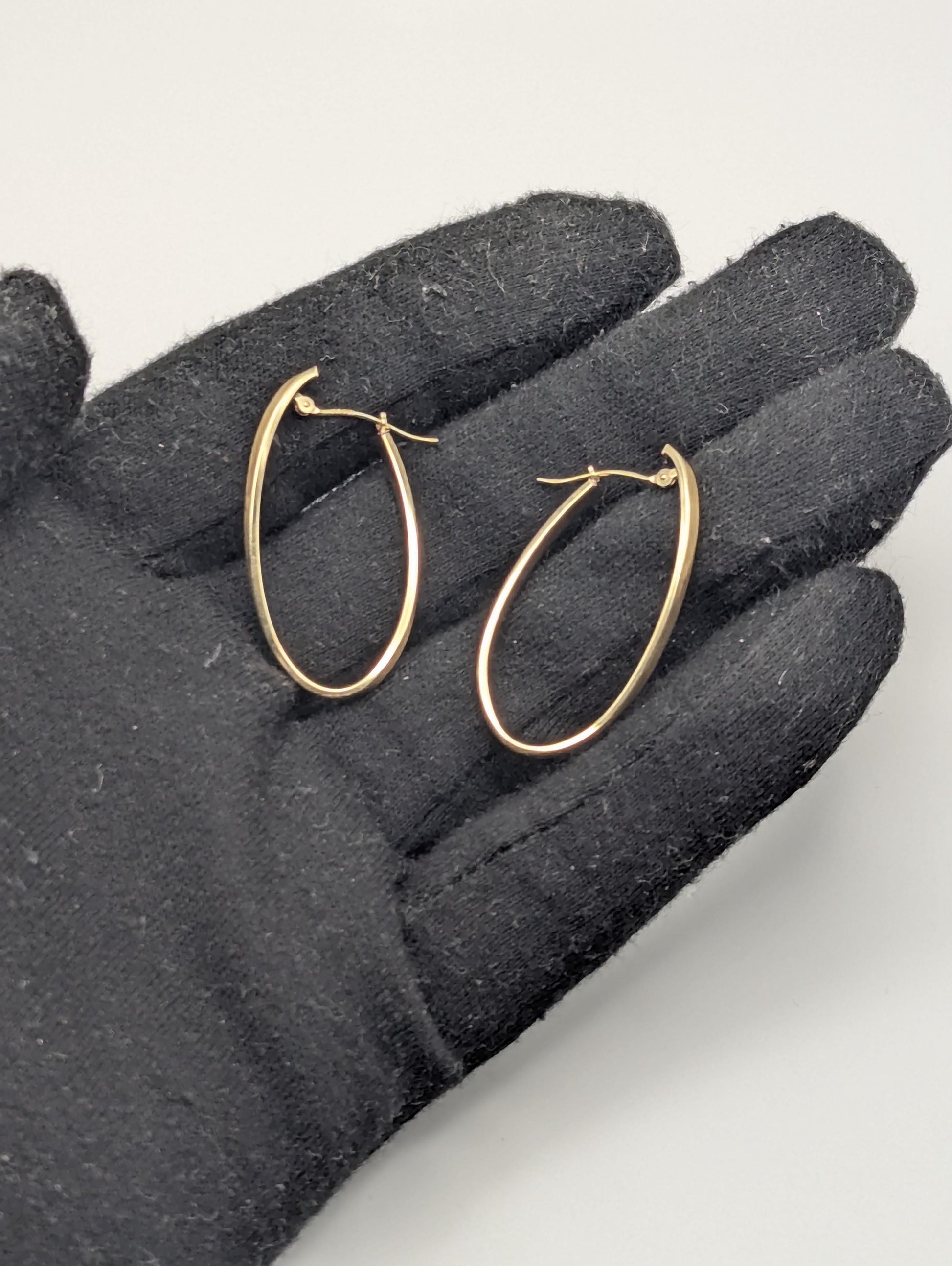 14k JCM Jacmel Twisted Long Hoop Earrings. Minimalist Twisted Hoops