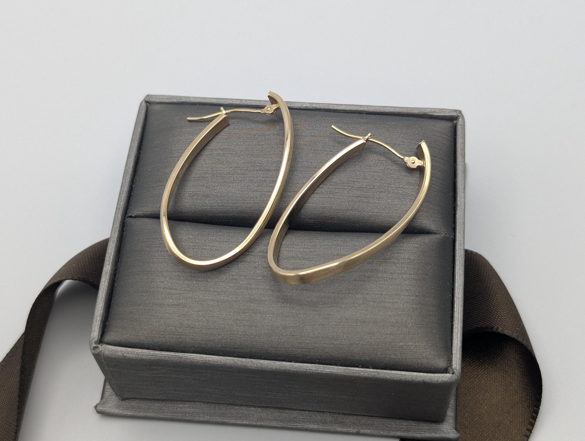 14k JCM Jacmel Twisted Long Hoop Earrings. Minimalist Twisted Hoops