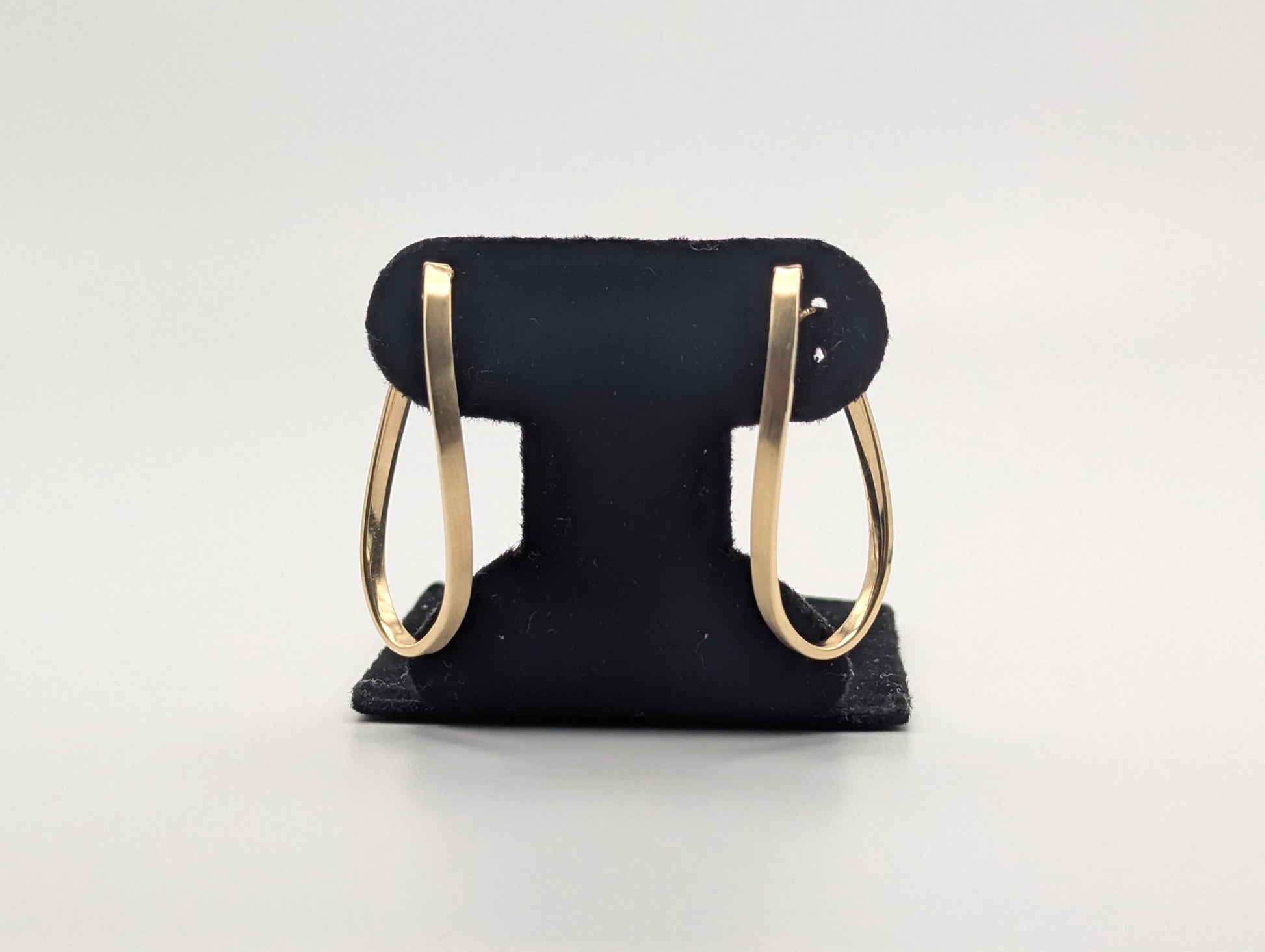 14k JCM Jacmel Twisted Long Hoop Earrings. Minimalist Twisted Hoops