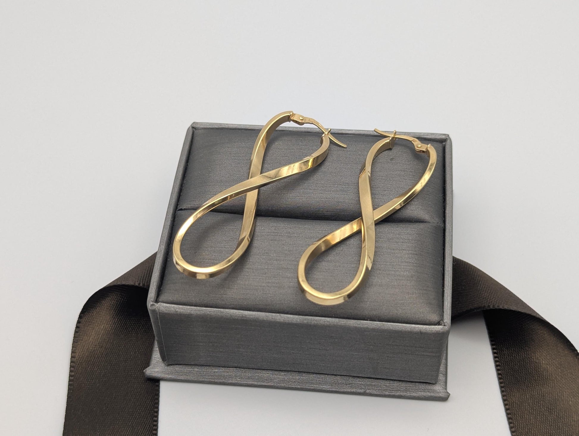 14k ITALY Twisted Long Infinity Hoop Earrings. Etched Twisted Hoops