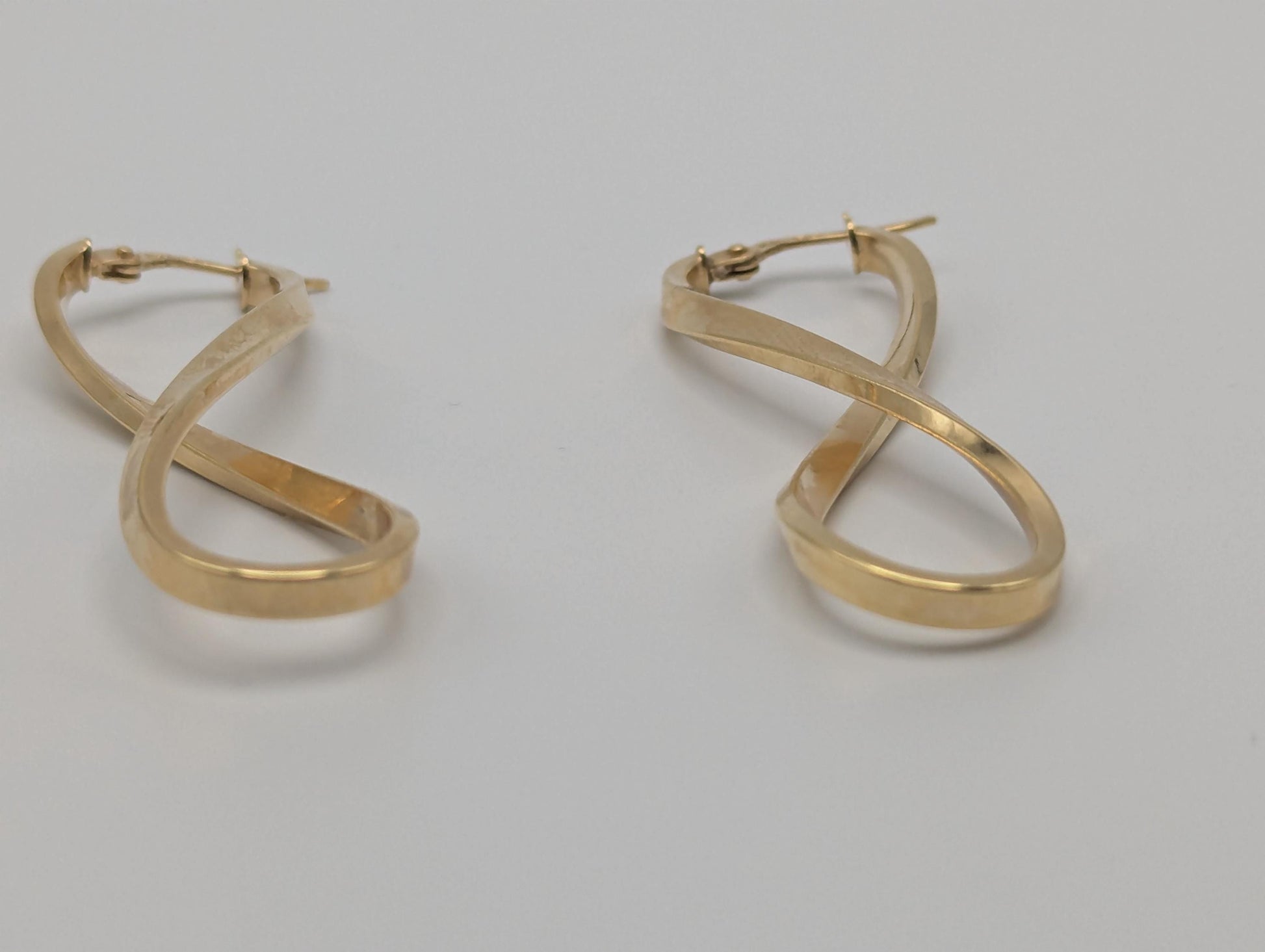 14k ITALY Twisted Long Infinity Hoop Earrings. Etched Twisted Hoops