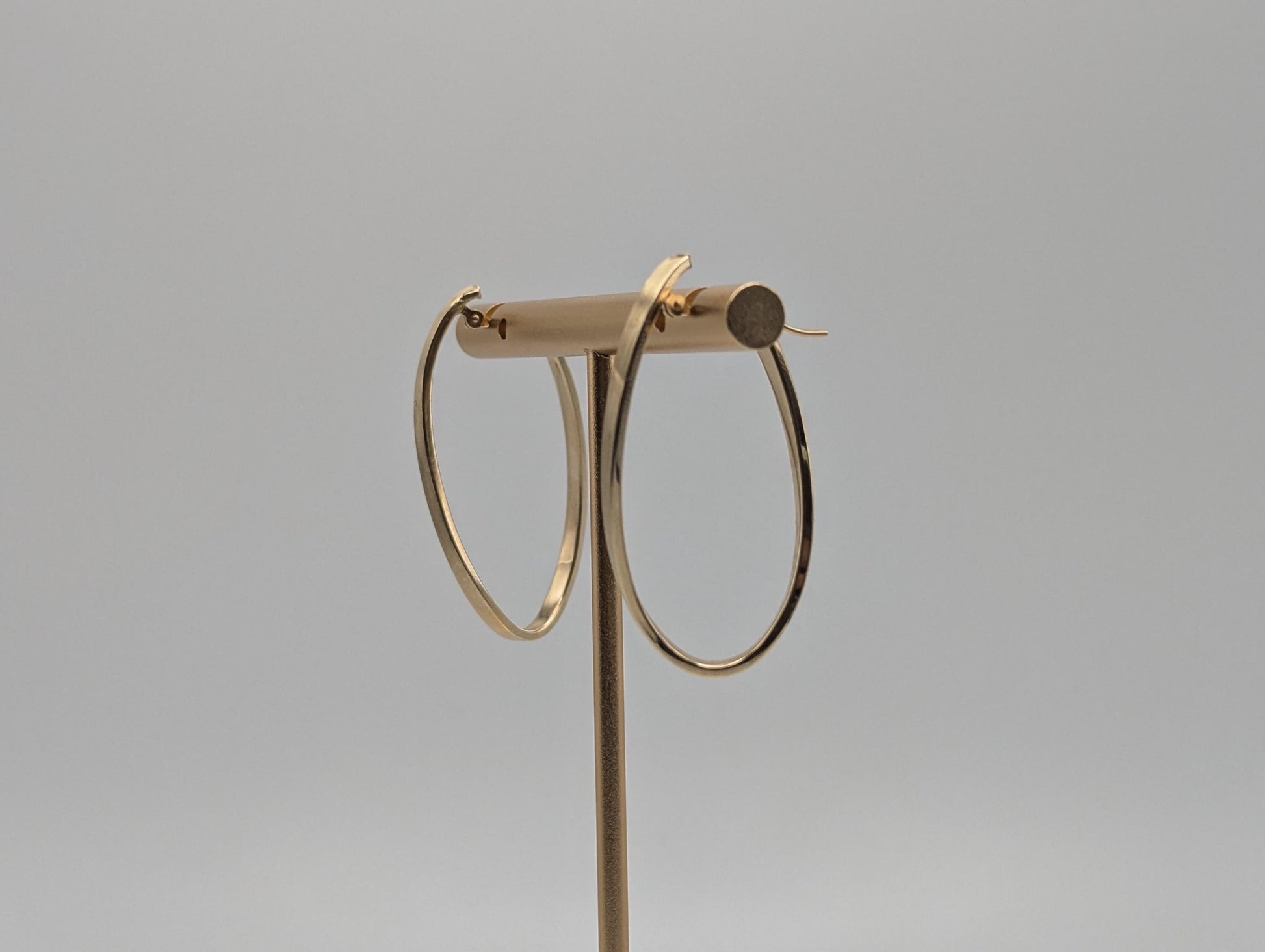 14k JCM Jacmel Twisted Long Hoop Earrings. Minimalist Twisted Hoops