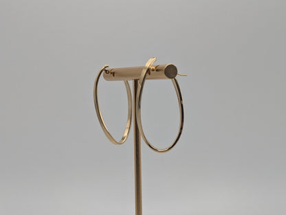 14k JCM Jacmel Twisted Long Hoop Earrings. Minimalist Twisted Hoops