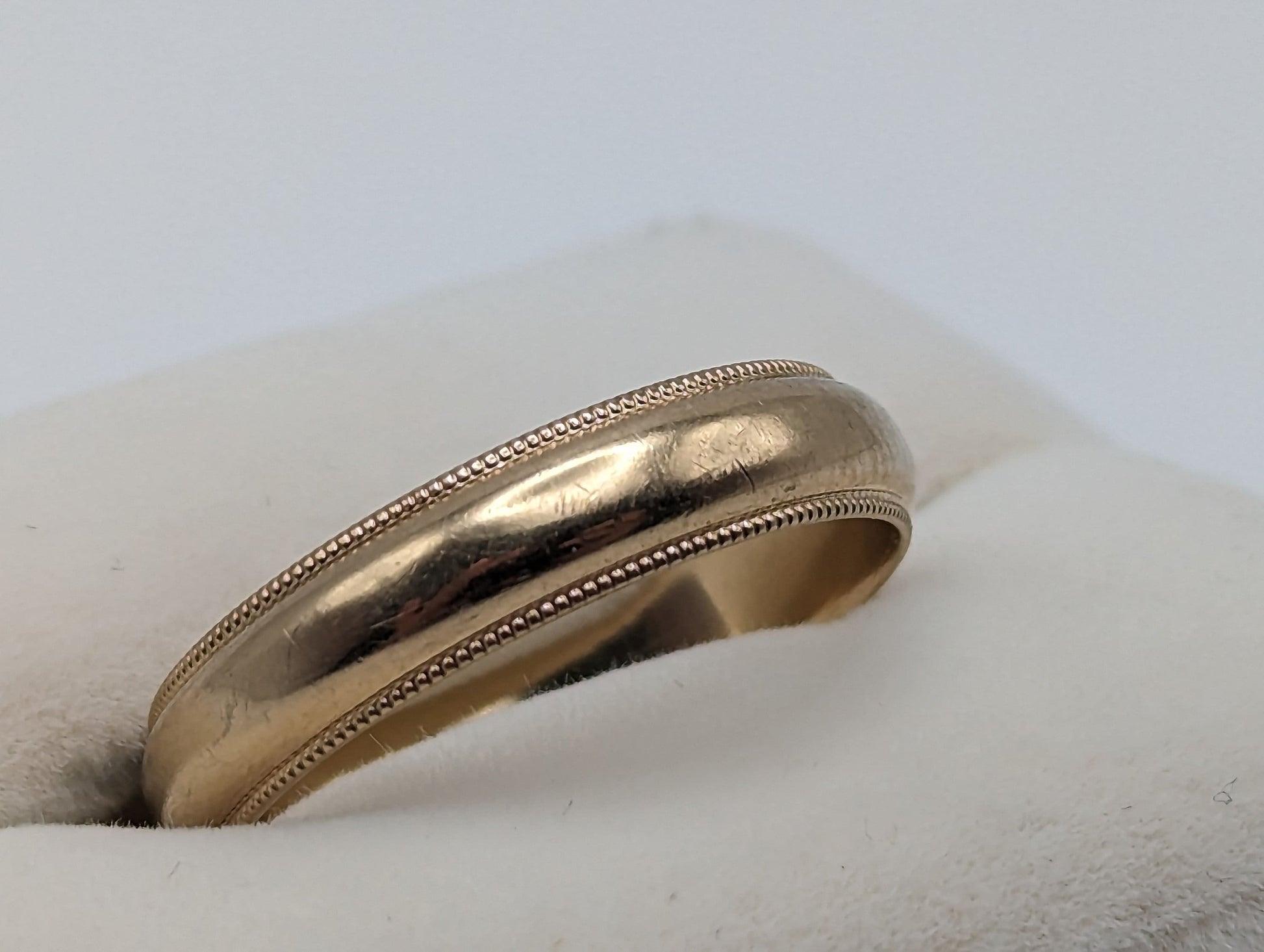 4.2 grams Friedman's 10k Gold 5mm Milgrain Half Round Wedding Band. 10k Yellow Gold Milgrain Band. Yellow Gold Wedding Engagement Band