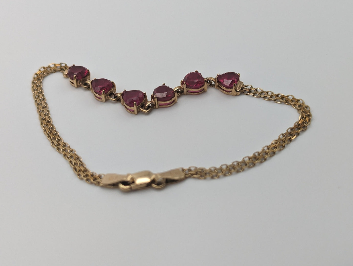 10k Yellow Gold 6 Ruby Heart Bracelet. Womens Ruby Heart Bracelet. 10k Womens 6 Heart Yellow Gold Bracelet. 10k Ruby Heart Bracelet.