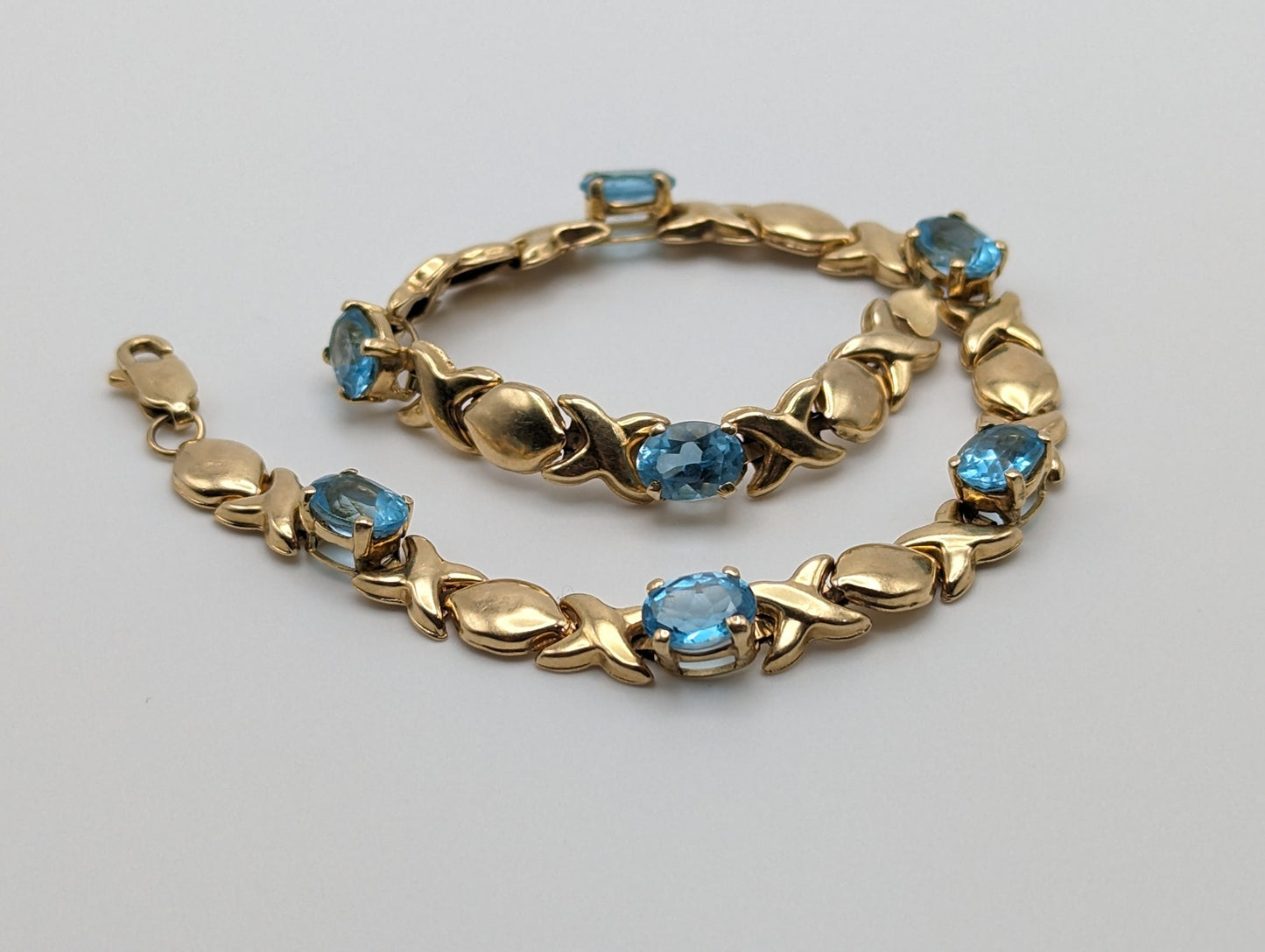 14k Solid Yellow Gold Swiss BlueTopaz Bracelet. XO Hugs & Kisses 14k Yellow Gold Bracelet 8". Womens 14k Swiss Blue Topaz XO bracelet.