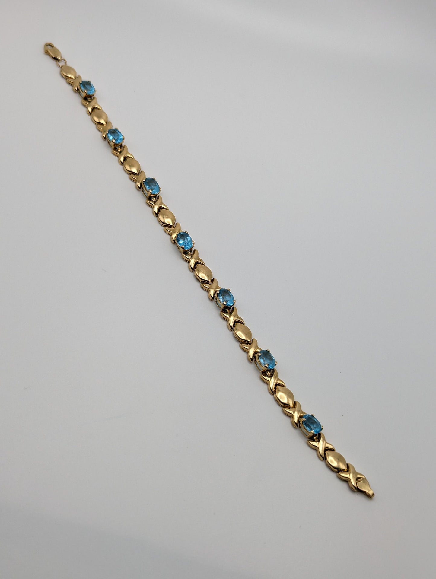 14k Solid Yellow Gold Swiss BlueTopaz Bracelet. XO Hugs & Kisses 14k Yellow Gold Bracelet 8". Womens 14k Swiss Blue Topaz XO bracelet.