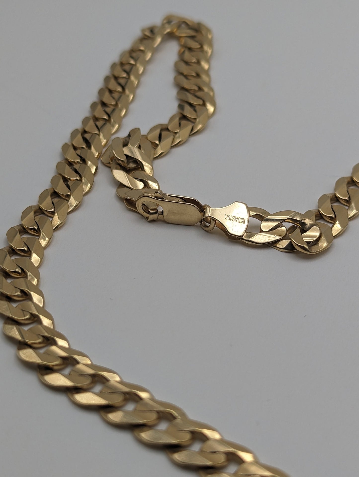 49 Grams Cuban Chain 22 inch Yellow Gold 10k. 10k Yellow Gold Mens Miami Cuban Curb Link 22" 8.5mm Chain. Heavy Cuban Link 10k Necklace