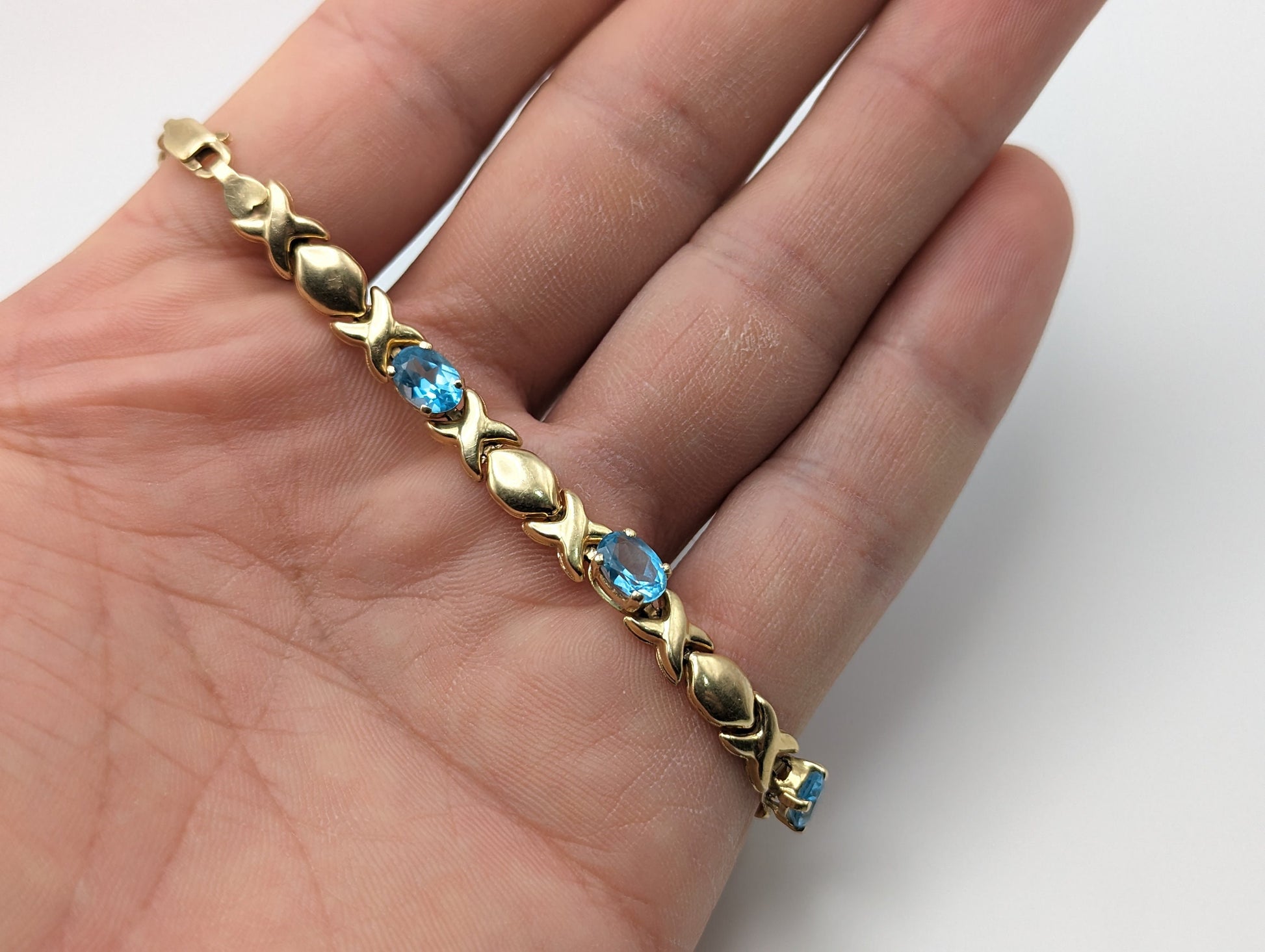 14k Solid Yellow Gold Swiss BlueTopaz Bracelet. XO Hugs & Kisses 14k Yellow Gold Bracelet 8". Womens 14k Swiss Blue Topaz XO bracelet.