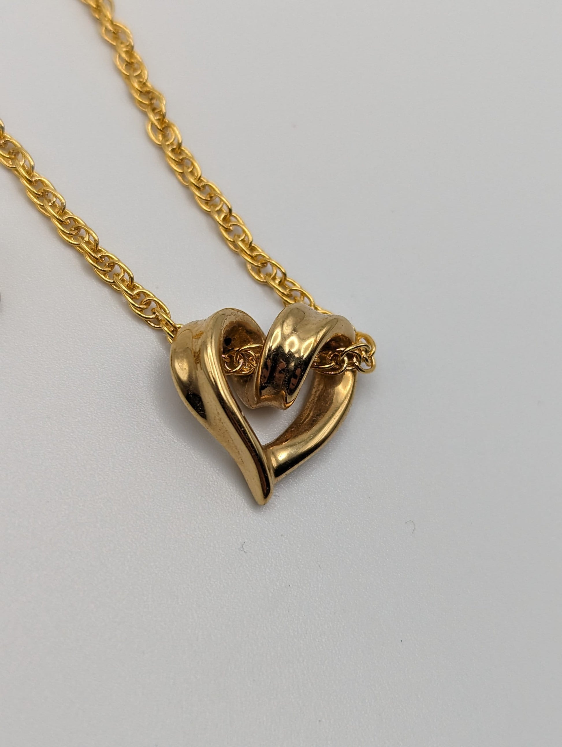 10k Yellow Gold Twist Heart Pendant. 10k Infinity Heart Pendant. Complimentary 14k GF necklace