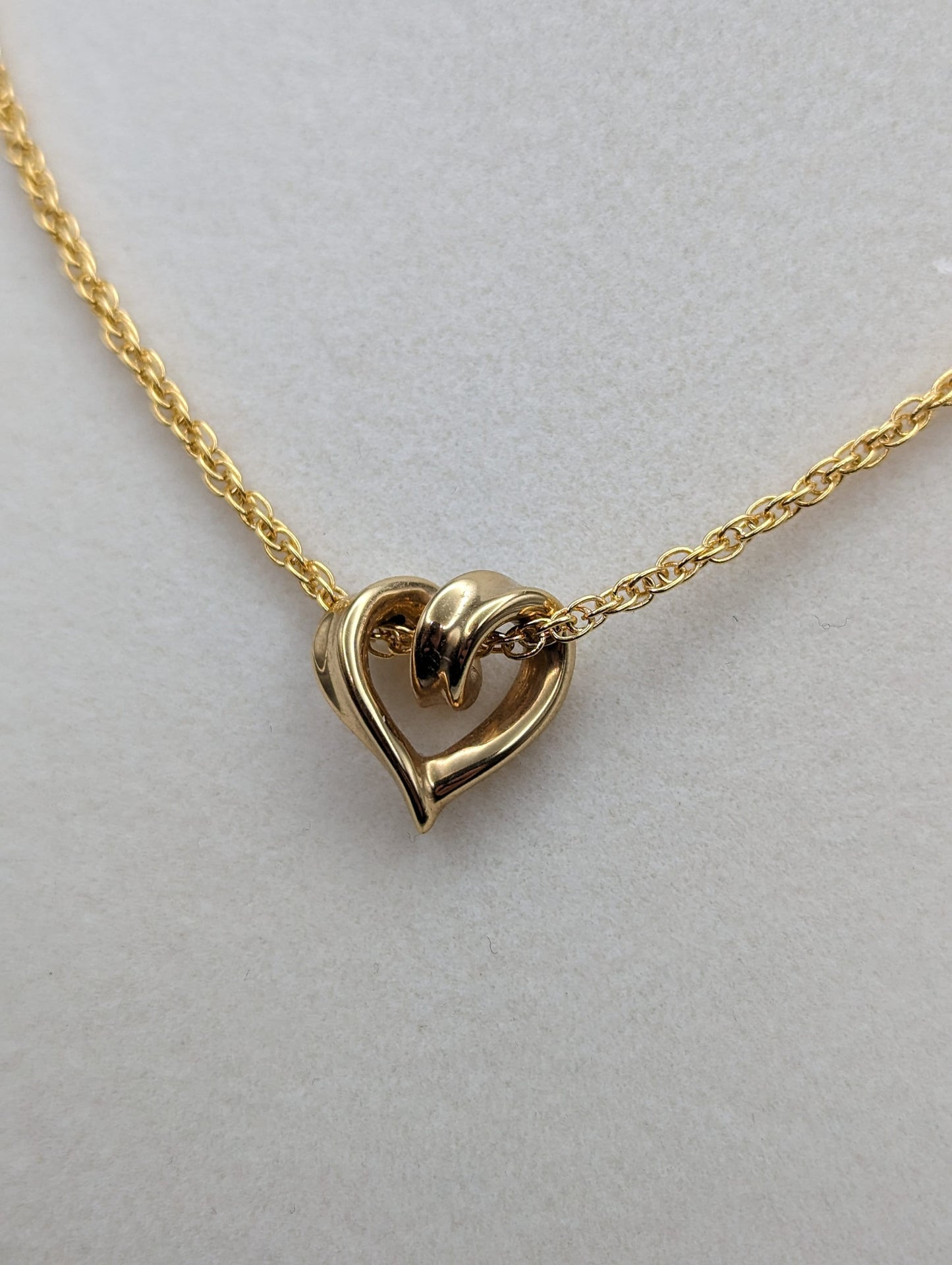 10k Yellow Gold Twist Heart Pendant. 10k Infinity Heart Pendant. Complimentary 14k GF necklace