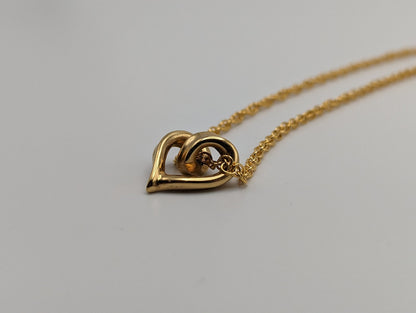 10k Yellow Gold Twist Heart Pendant. 10k Infinity Heart Pendant. Complimentary 14k GF necklace