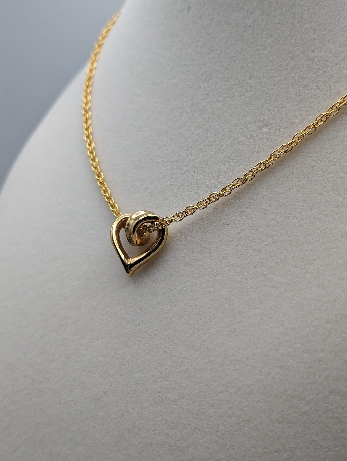 10k Yellow Gold Twist Heart Pendant. 10k Infinity Heart Pendant. Complimentary 14k GF necklace