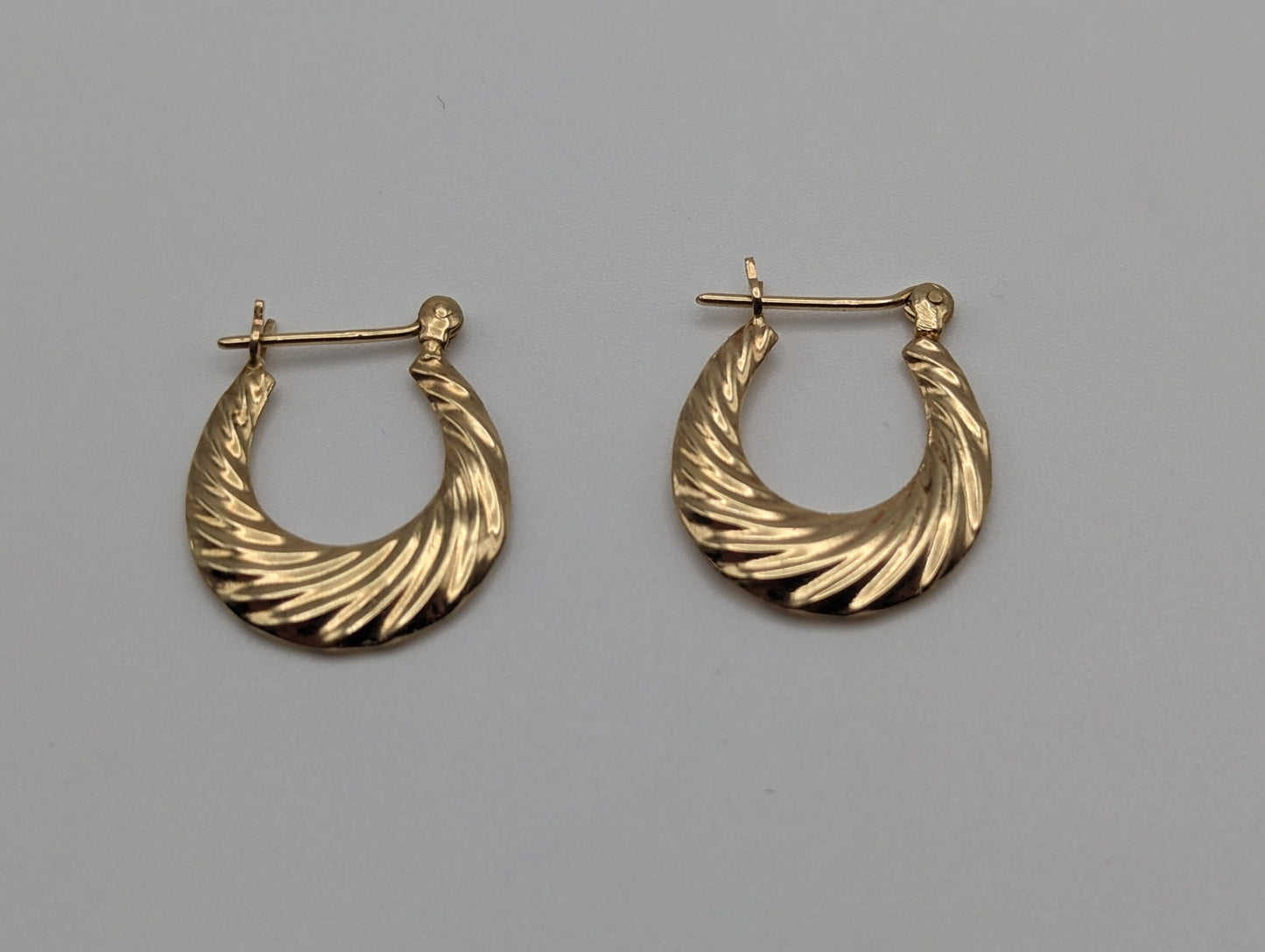 14k Yellow Gold Hollow Puff Earrings. 14k Gold Hollow Shrimp Hoop Earrings. 14k Hollow Hoop Earrings. 14k Gold Hoops.