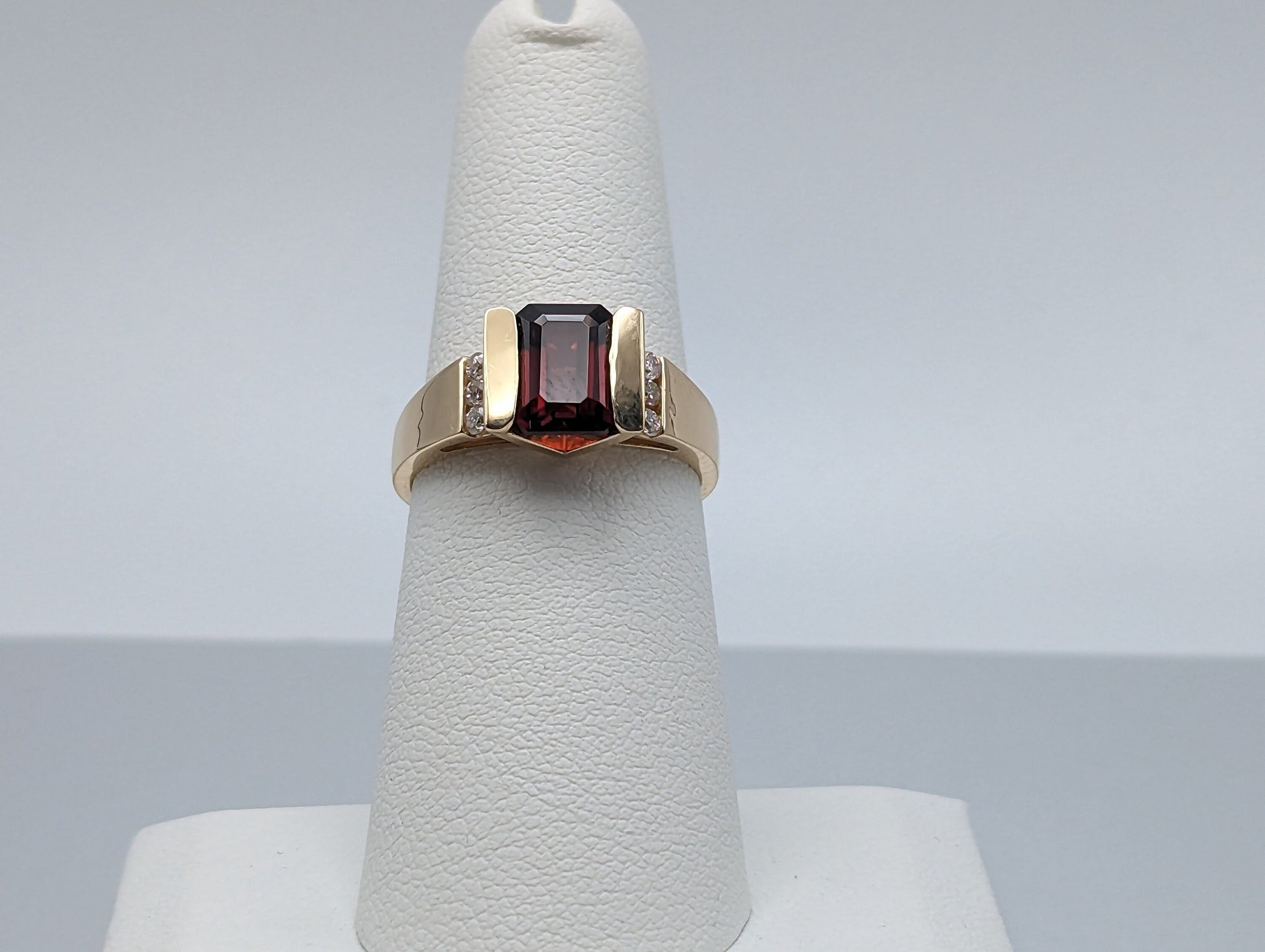 14k Yellow Gold Emerald Cut Garnet and Diamonds Chanel Setting Ring. 14k Garnet and Diamonds Cocktail Ring.