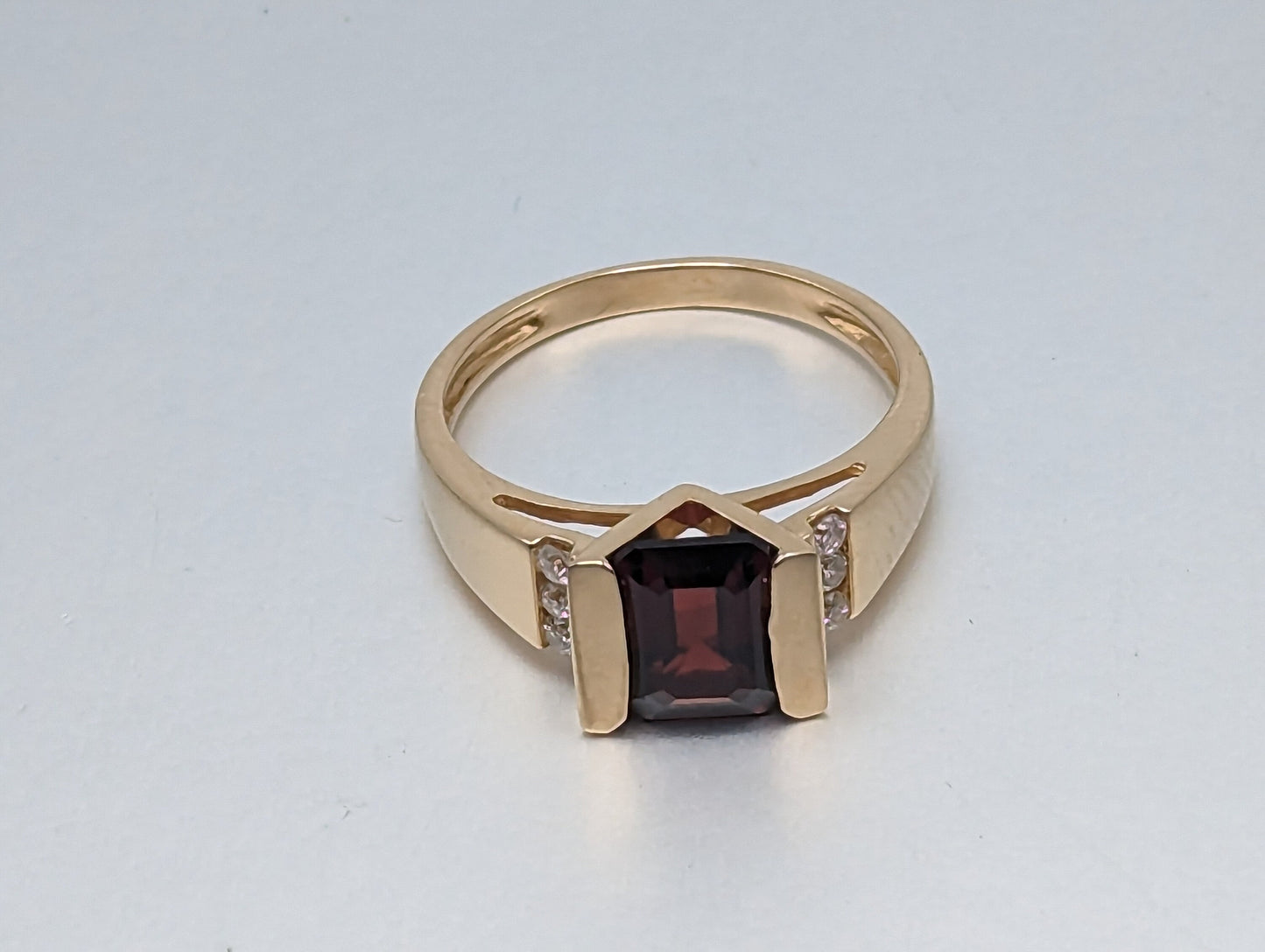 14k Yellow Gold Emerald Cut Garnet and Diamonds Chanel Setting Ring. 14k Garnet and Diamonds Cocktail Ring.