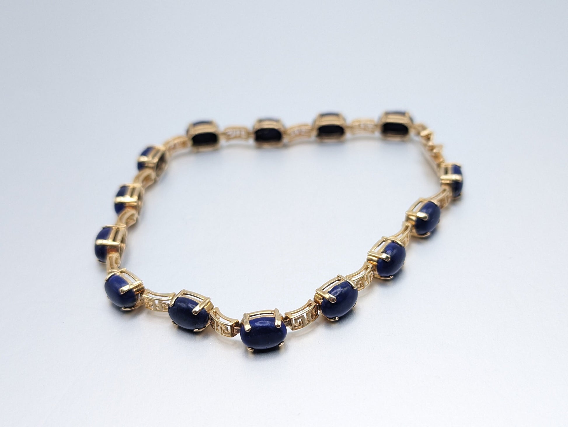 14kt Yellow Gold & Lapis Lazuli Oval Cabochon Greek Key Tennis Bracelet. 14kt Lapis Yellow Gold Bracelet.