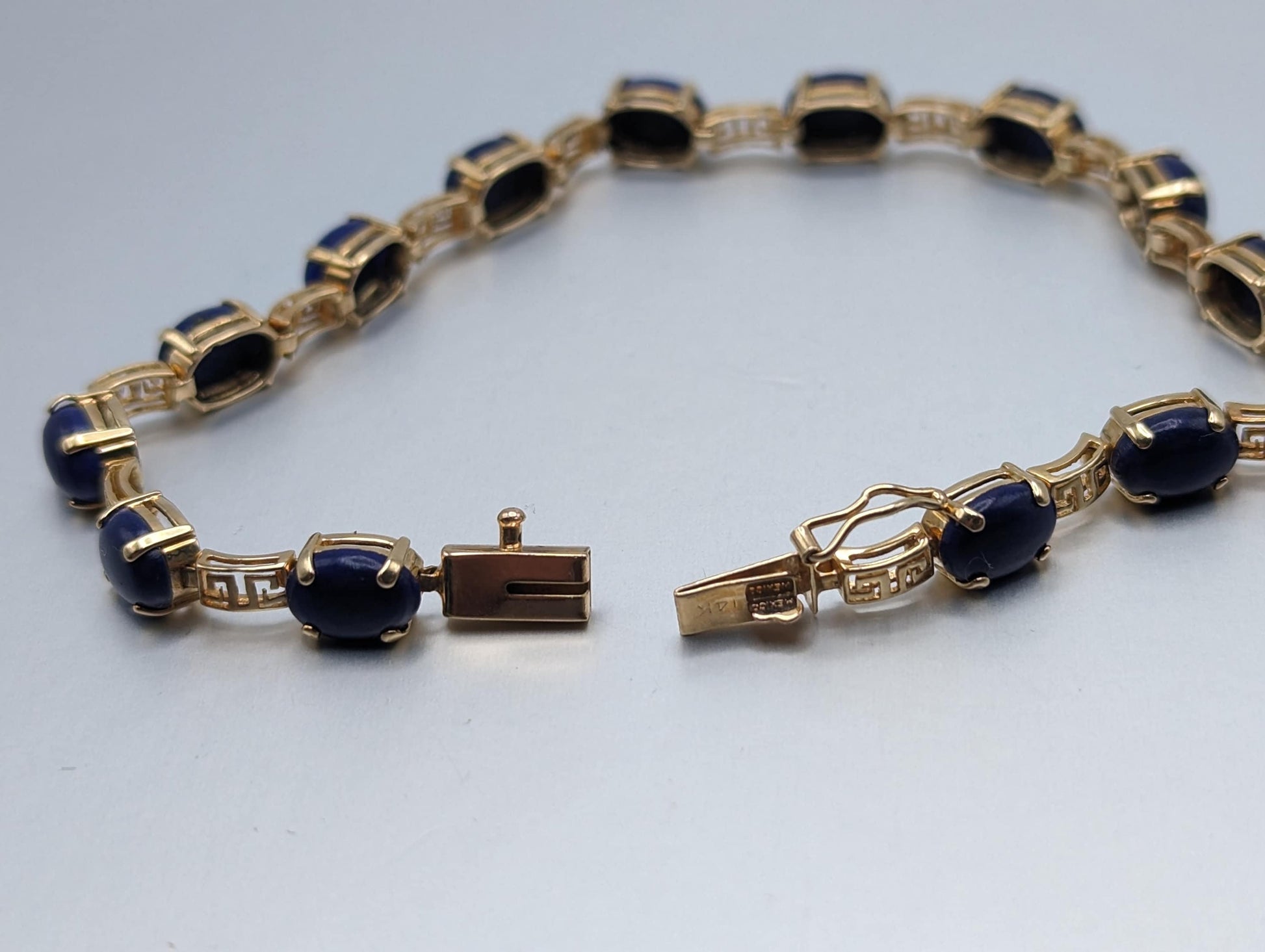 14kt Yellow Gold & Lapis Lazuli Oval Cabochon Greek Key Tennis Bracelet. 14kt Lapis Yellow Gold Bracelet.