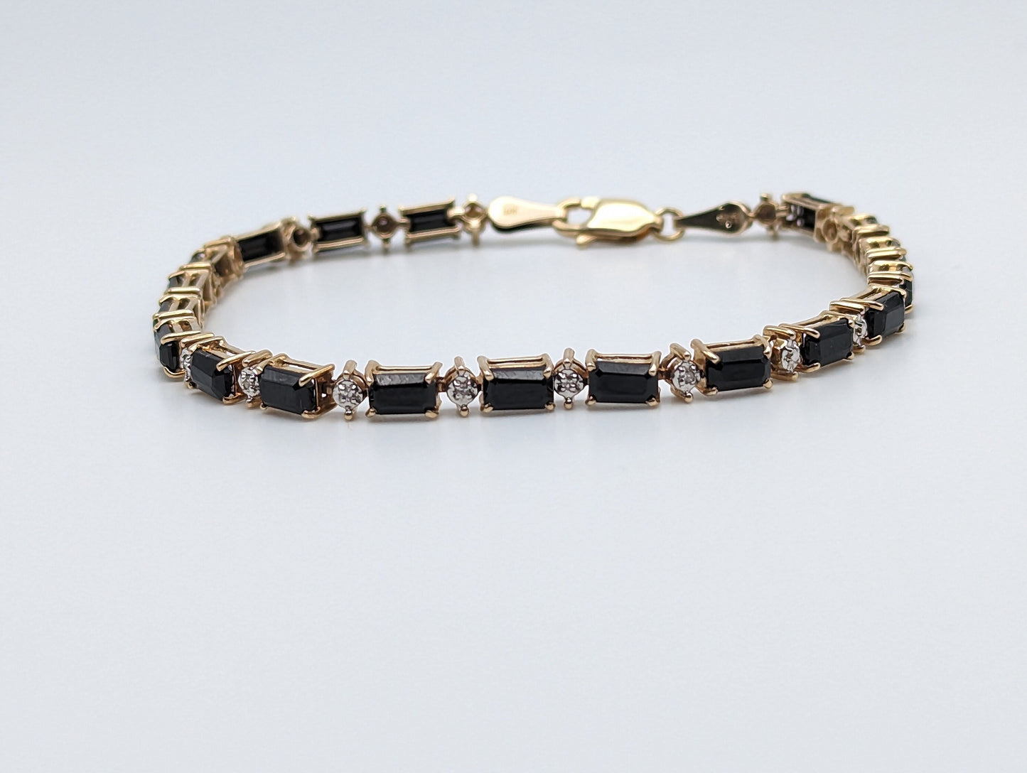 10k Onyx Diamond Yellow Gold Tennis Bracelet. 10k Onyx Diamond Bracelet. 8" Womens Onyx Gold Tennis Bracelet.