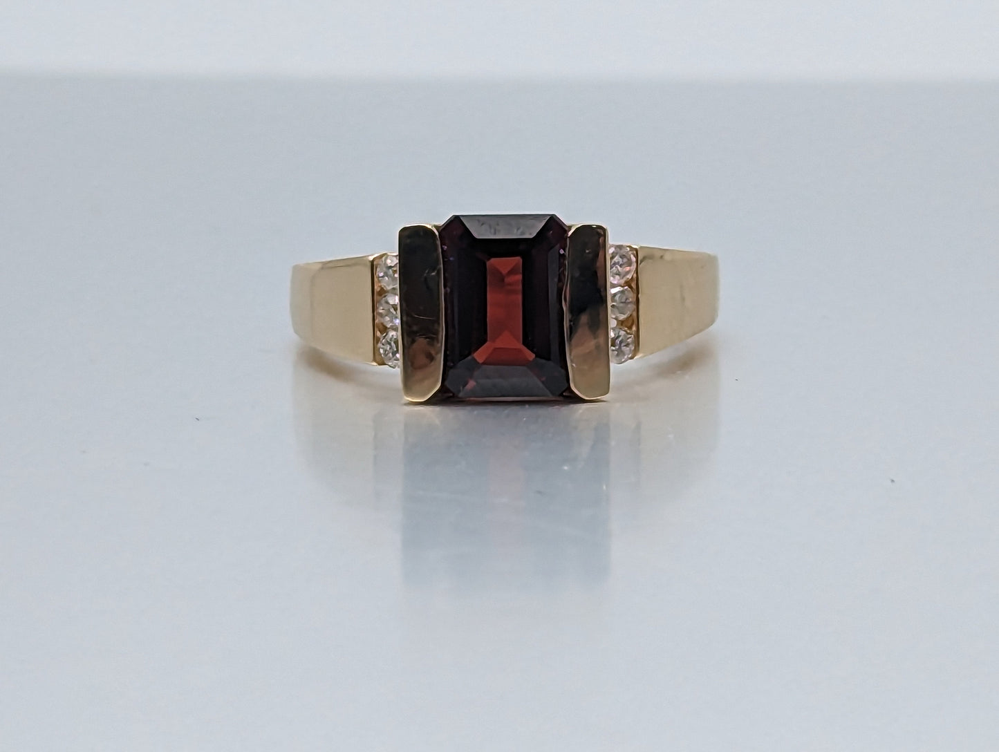 14k Yellow Gold Emerald Cut Garnet and Diamonds Chanel Setting Ring. 14k Garnet and Diamonds Cocktail Ring.